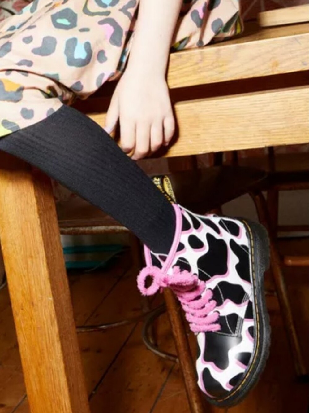 Dr. Martens Adult 1460 Cow Print Patent Leather Boots in White & Pink Sale Pric